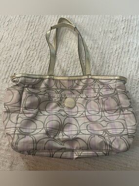 Coach Vintage Y2K Signature Canvas and Patent Leather Bag
Lilac
